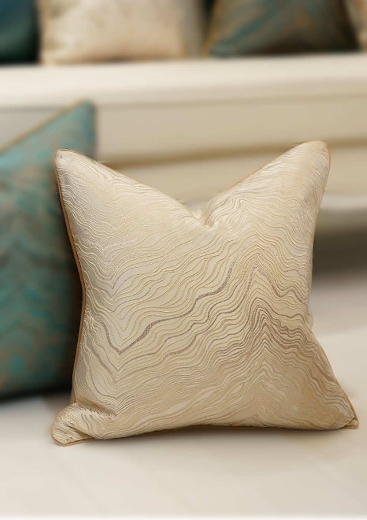 Luxurious beige and gold cushion cover with hidden zipper closure