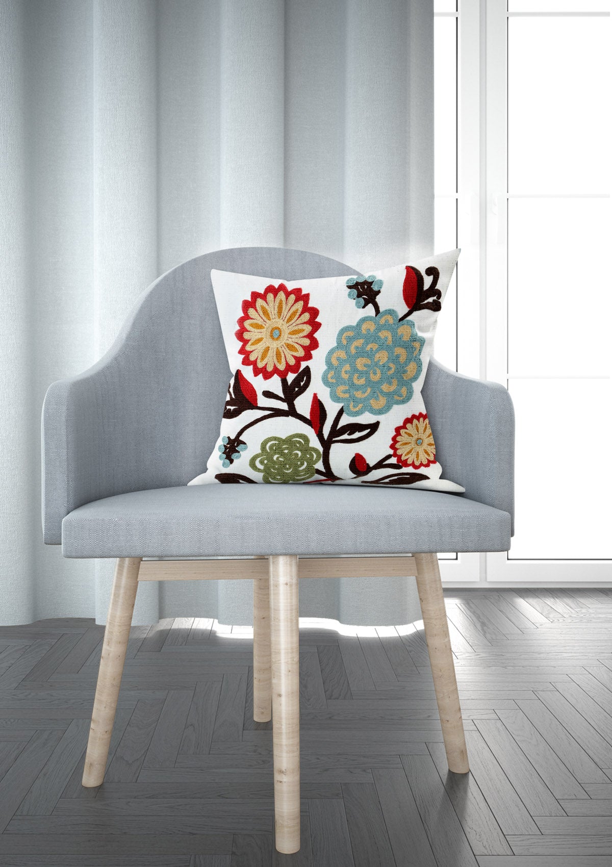 Colorful floral cushion cover featuring a variety of vibrant flowers in full bloom